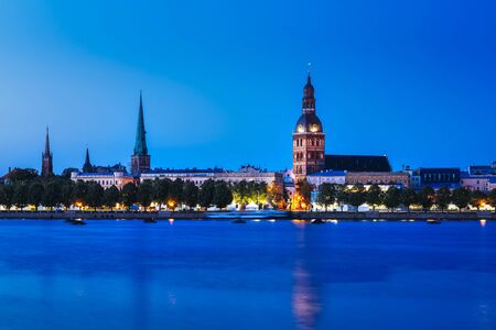 Riga's skyline at night, Old Town, Riga, Latvia, Europeの写真素材