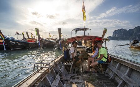 Krabi, Thailand - DECEMBER 24, 2019: Long tail boats on Railay beach in Railay, Ao Nang, Krabi Province, Thailand, Southeast Asia, Asiaのeditorial素材