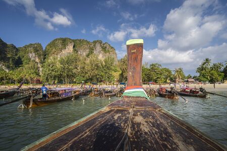 Krabi, Thailand - DECEMBER 24, 2019: Long tail boats on Railay beach in Railay, Ao Nang, Krabi...