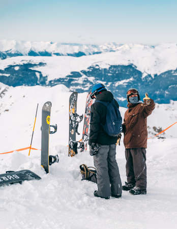 Snowboarders at La Plagne ski resort, French Alps, Tarentaise, France, Europe