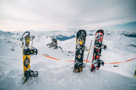 Snowboards stuck in the snow at La Plagne ski resort, French Alps, Tarentaise, France, Europeのeditorial素材