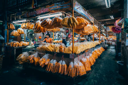 Bangkok, Thailand - December 18th 2019: Bangkok street market at night, food, flowers, Thailand, SouthEast Asiaのeditorial素材