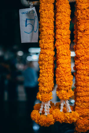 Bangkok, Thailand - December 18th 2019: Bangkok street market at night, food, flowers, Thailand, SouthEast Asiaのeditorial素材
