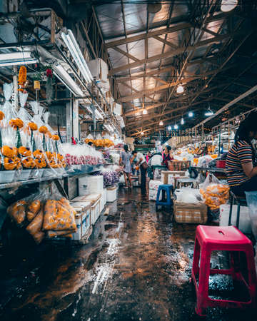 Bangkok, Thailand - December 18th 2019: Bangkok street market at night, food, flowers, Thailand, SouthEast Asiaのeditorial素材
