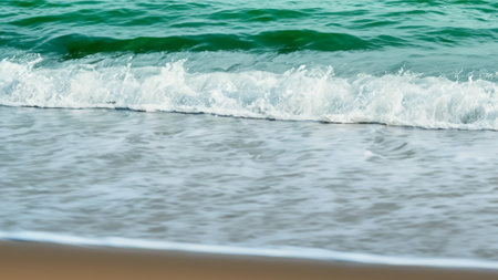Sea wave on the sandy beach. Selective focus. nature.の素材