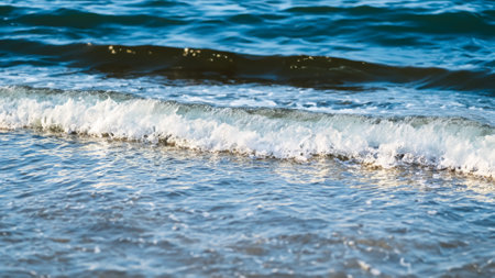 sea wave on the beach, close-up, shallow depth of fieldの素材