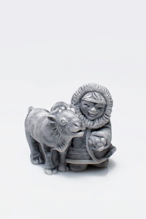 North man figurine against white background