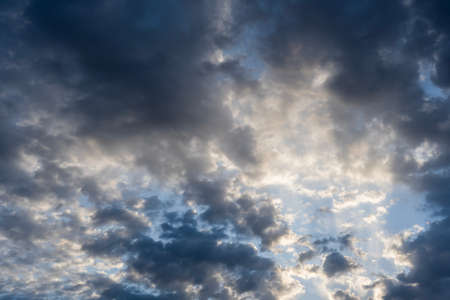 Amazing clouds in the sky before sunsetの写真素材