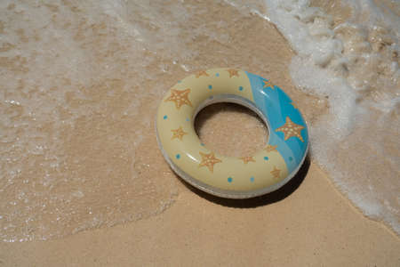 inflatable circle on the beachの写真素材