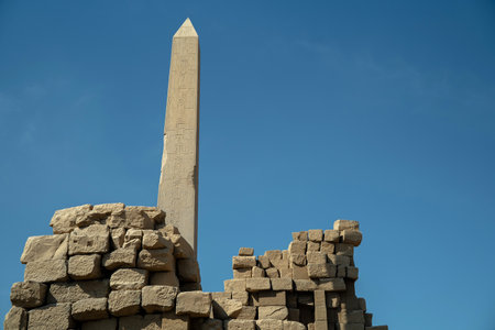 Obelisk in the ancient city of Karnak among the ruinsの写真素材