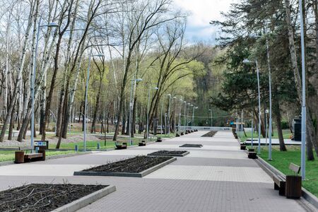 Empty city park without people. The concept of quarantine due to the coronavirus pandemic.