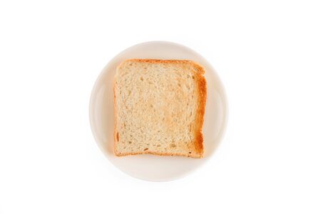 Toasted bread toast on a saucer isolated on a white background. View from above.の写真素材