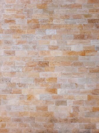 Limestone or sandstone wall texture.の写真素材