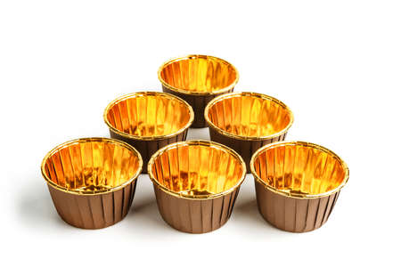Forms for baking cupcakes isolated on white background.の写真素材