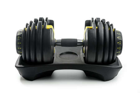 adjustable dumbbell isolated on white background. Modern sports equipment.の写真素材