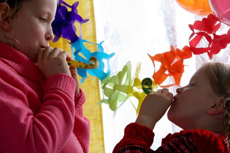 Two girls making noiseの写真素材