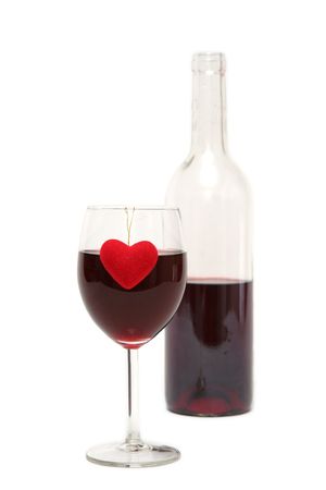 Glass of rd wine on a white backgroundの写真素材