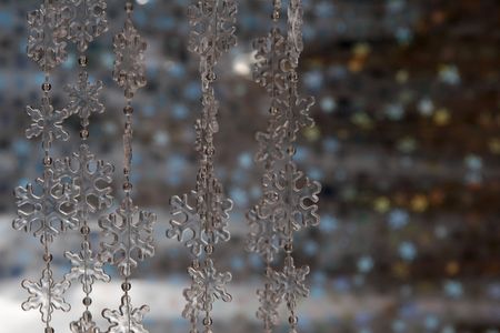 Silver stars chain on a glittering backgroundの写真素材