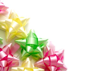 Plenty of colorful bows on a white background