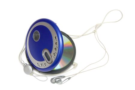 Compact discs and round  blue cd playerの写真素材