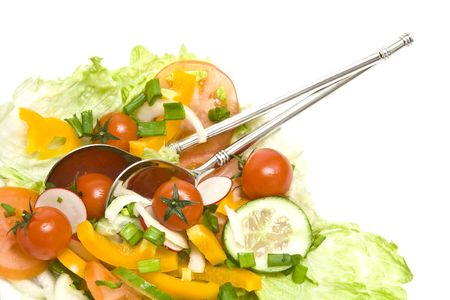 Fresh salad made of vegetables like tomatoes or cucumbersの写真素材