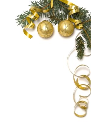 Golden  bulbs and spruce twigs on a whiteの写真素材