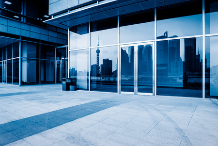shanghai cityspace and skyline reflected on the glass wallの写真素材