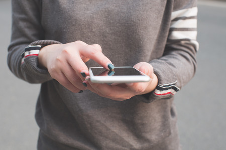 Woman using mobile phoneの写真素材