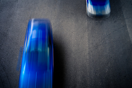 blurred car speeding on highwayの写真素材
