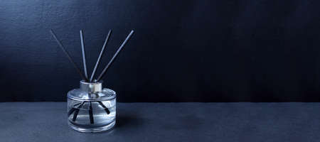 The luxury scented aroma room fresherner reed diffser sticks glass bottle with black fiber sticks is...