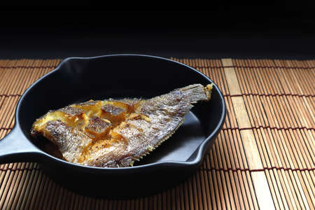 Thai crispy gourami fish , gouramy or Sepat Siam fish or Pla salid in Thai language displayed on the...