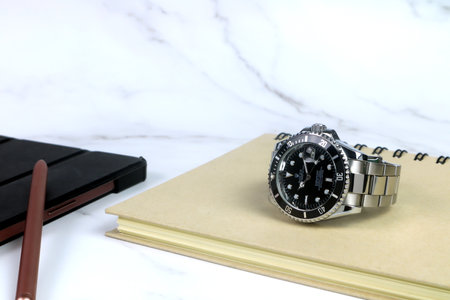 The Rolex vintage wristwatch ceramic bezel model black oyster perpetual submariner date 39 mm...