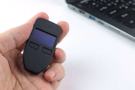 black hardware wallet for buying , selling and protecting the crypto currency from hackers is in the...