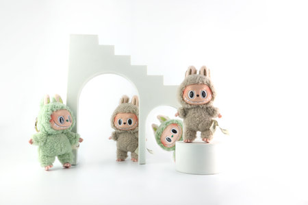 art toys Labubu key chain collection from Pop Mart blind box collectable cute toys display on white shelf background at Pop mart flagship store during new release promotion event lのeditorial素材