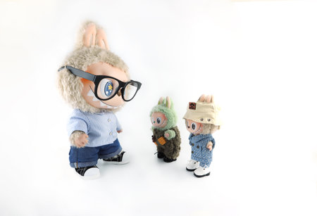 art toys Labubu flip with me collection from Pop Mart blind box collectable cute toys display on white shelf background at Pop mart flagship store during new release zimomo event lのeditorial素材