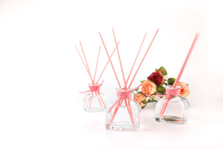 clear luxury aroma scent reed diffuser glass bottle is on white marble table to creat romantic and...