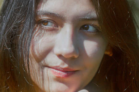 Portrait of a beautiful girl with long hair.の写真素材