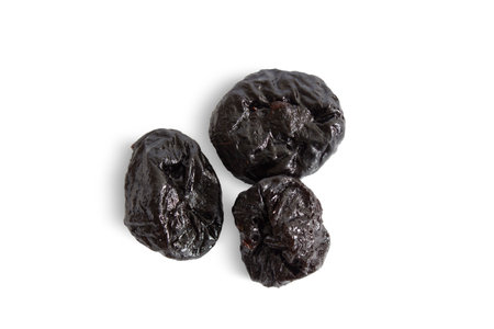 Prune isolated on white background. Dried fruitsの写真素材