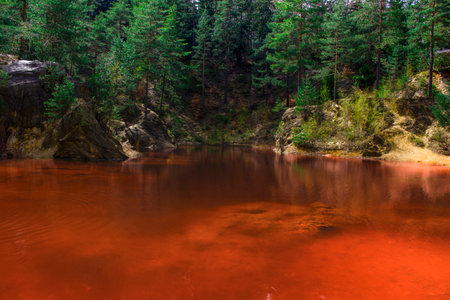 red lake. One of the four colored lakes at the foot of the Wielka Kopa mountainの写真素材