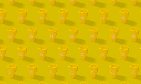 This image showcases a repeating pattern of yellow dice, each showing different numbers, arranged neatly on a vibrant yellow background.の写真素材