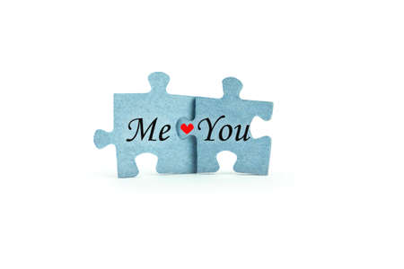 Two puzzles isolated on white background - Me and You.の写真素材