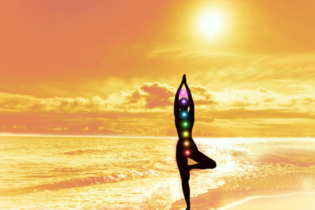 Silhouette of woman in tree pose of yoga. Sun sky and sea. Equilibrium calm harmony meditation. Concept of mental healthの写真素材