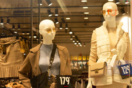 POLAND, BYDGOSZCZ - 18 September 2020: Women's outfits. Mannequins in shop window.のeditorial素材