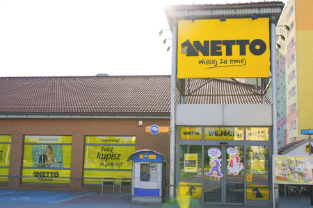 POLAND, BYDGOSZCZ - June 20, 2021: Logo Netto. European chain of local supermarkets of the Danish concern Salling Groupのeditorial素材