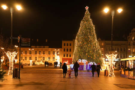 POLAND, BYDGOSZCZ - December 30, 2020: Night city in Christmas decorations. Festive street winter illuminationのeditorial素材