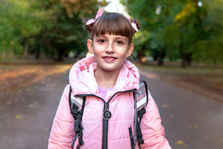 Happy girl goes to school. Everyday lifeの写真素材