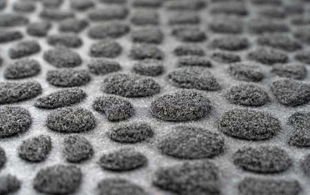 Black and gray spotted background. textured fur surfaceの写真素材