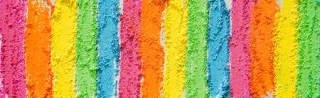 Rainbow creative background of lines drawn with multi-colored crayons. textured bright surfaceの写真素材