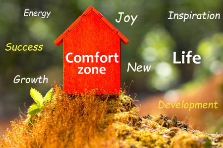 Concept of Comfort Zone. Red house in nature. Growth, personal development choice. Opportunities outside homeの写真素材