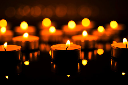 Burning candles in the night. Festive Christmas backgroundの写真素材
